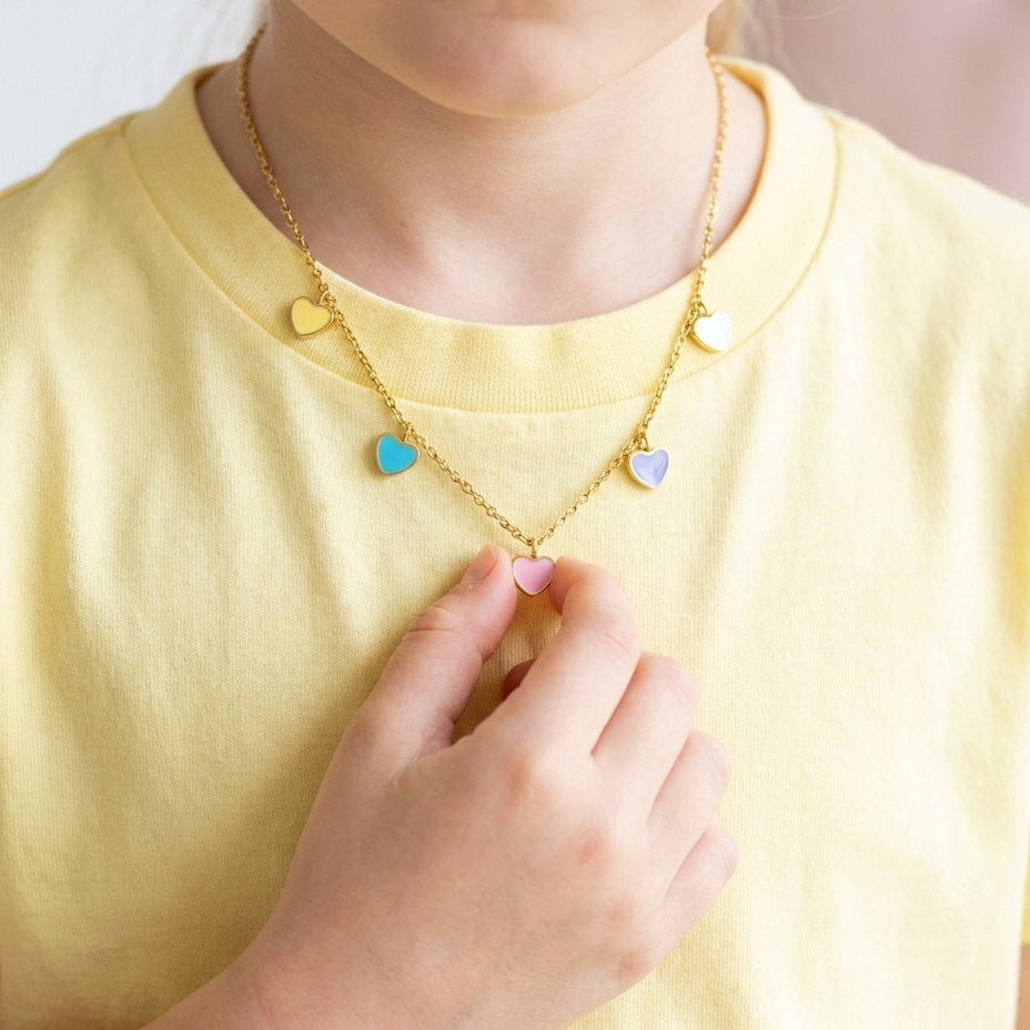Candy Hearts Necklace worn by a child in a yellow t-shirt