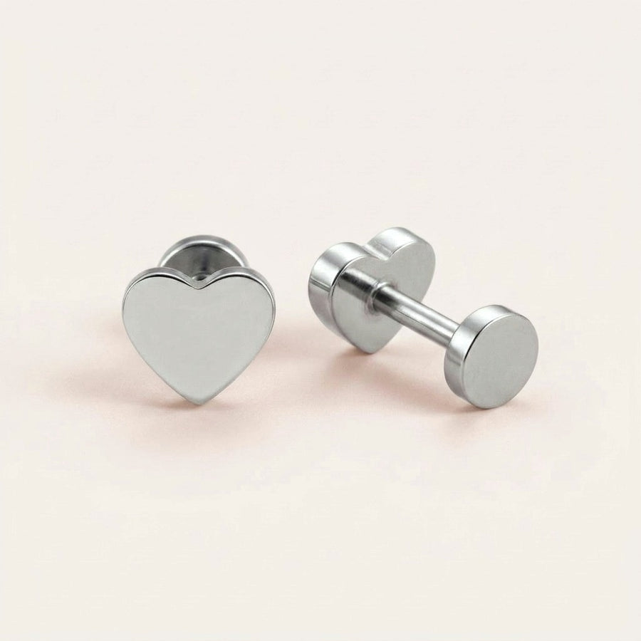 Classic Heart Flat Backs Silver on a soft stone background