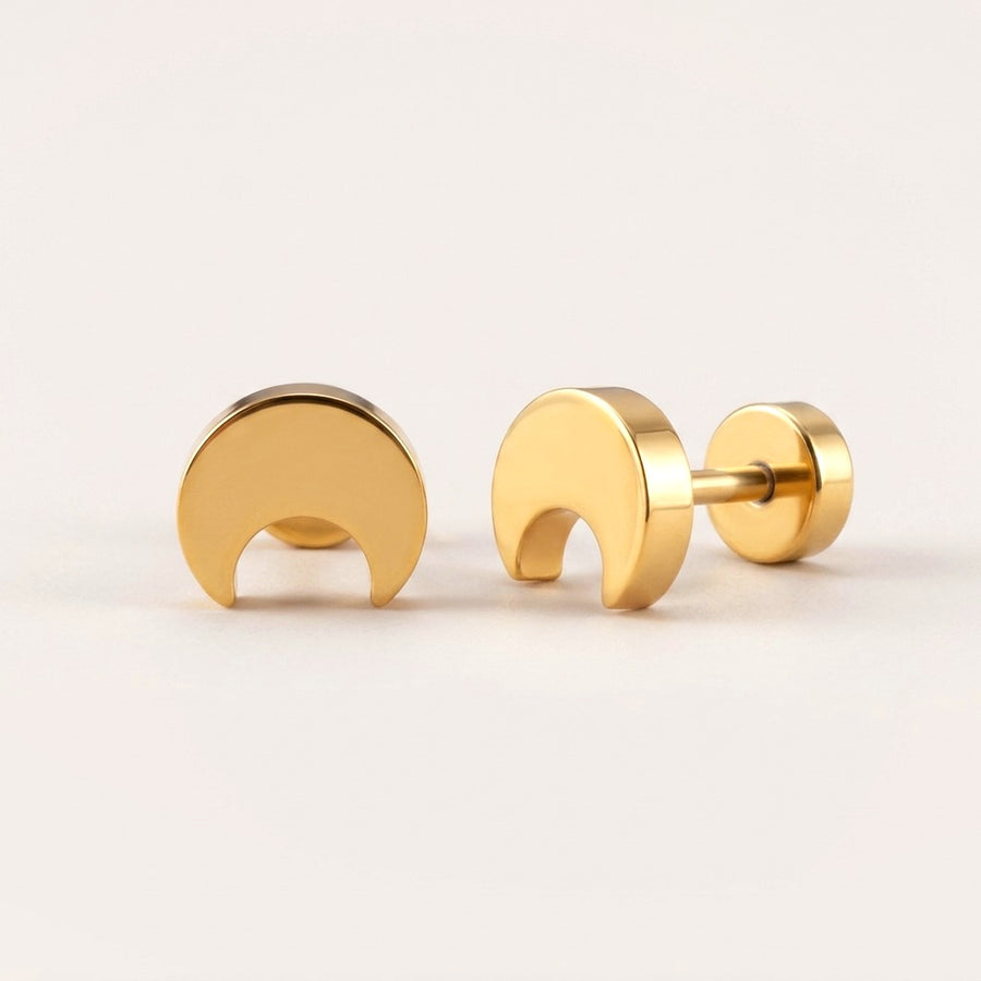 Crescent Flat Back Stud: hypoallergenic kids' flat back stud earrings, shown front and side on a soft stone background