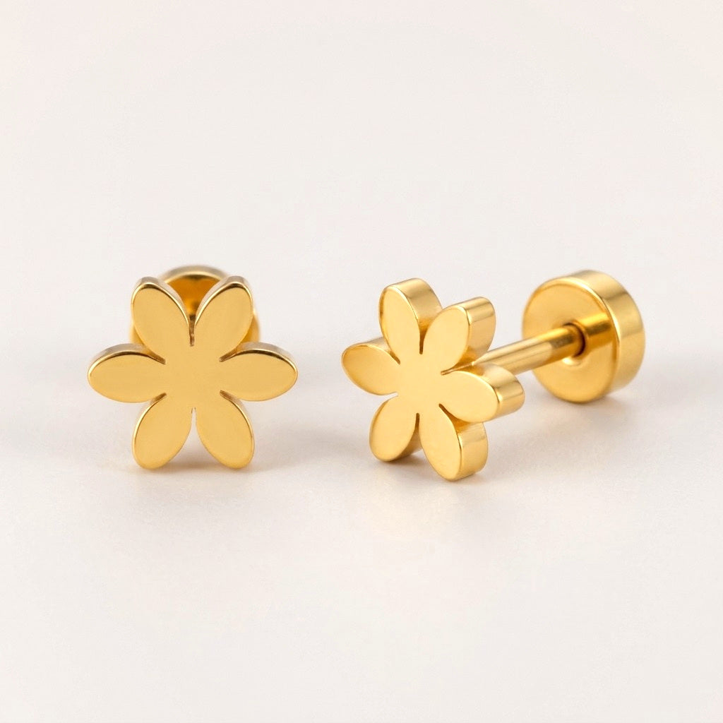 Flower Flat Back Studs: hypoallergenic kids' flat back stud earrings, shown front and side on a soft stone background