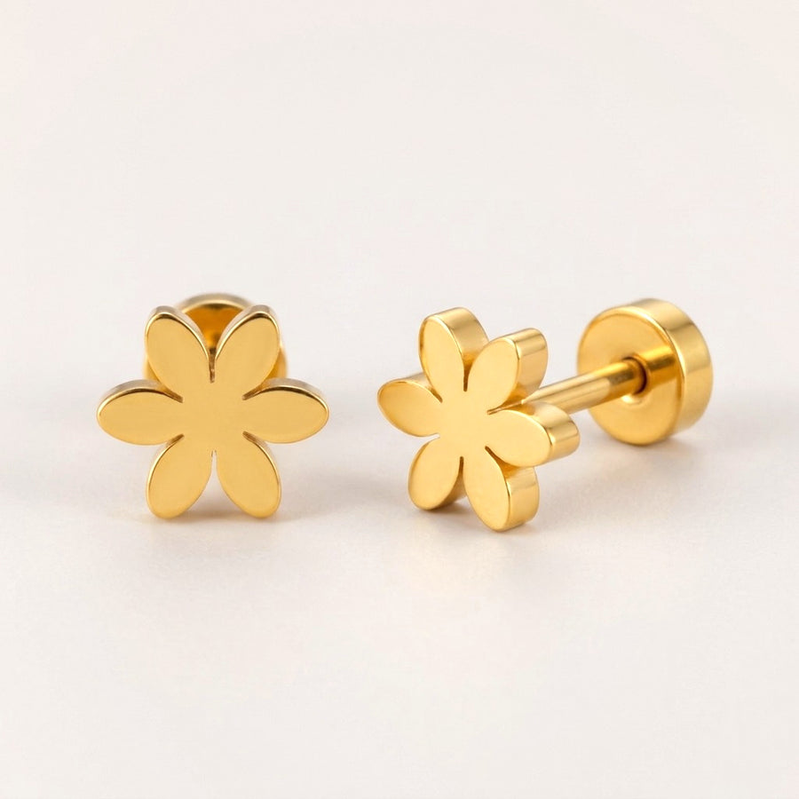 Flower Flat Back Studs: hypoallergenic kids' flat back stud earrings, shown front and side on a soft stone background