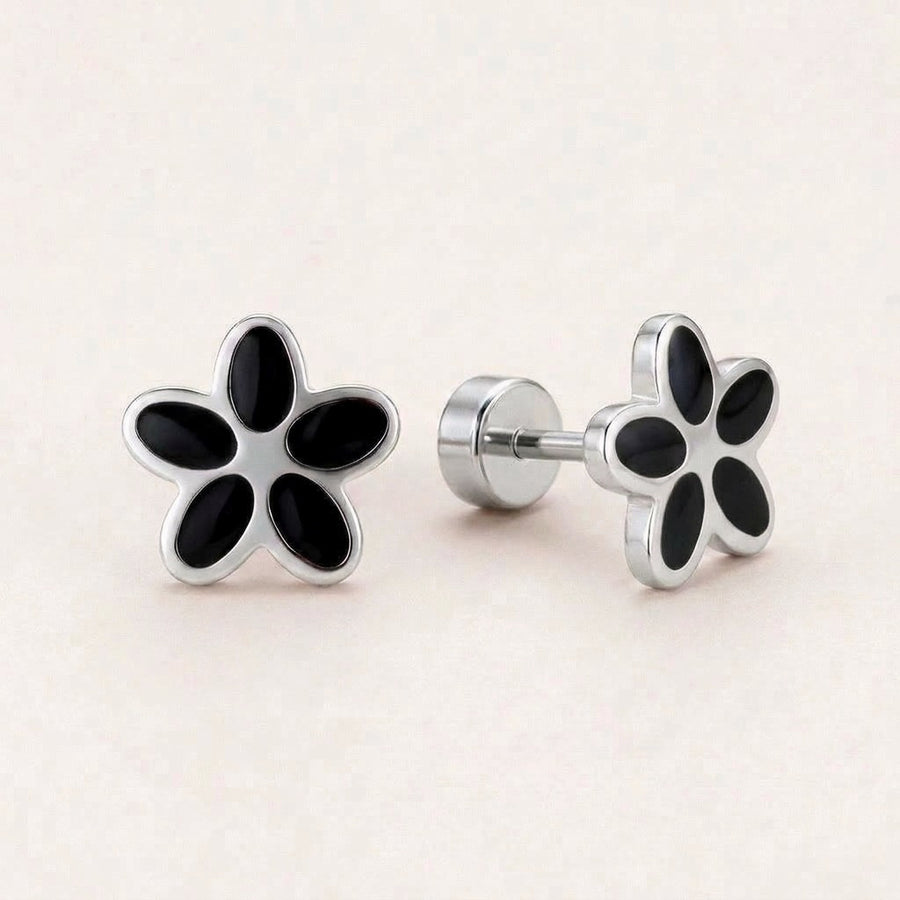 Flower Flat Back Studs Silver in Black: hypoallergenic kids' flat back stud earrings, shown front and side on a soft stone background