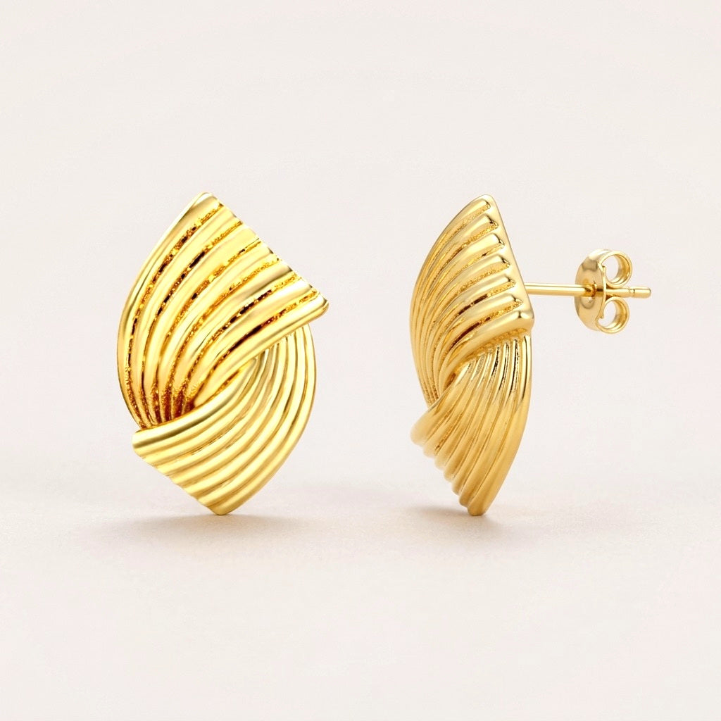 Gold Fold Studs: hypoallergenic stud earrings, shown front and side on a soft stone background
