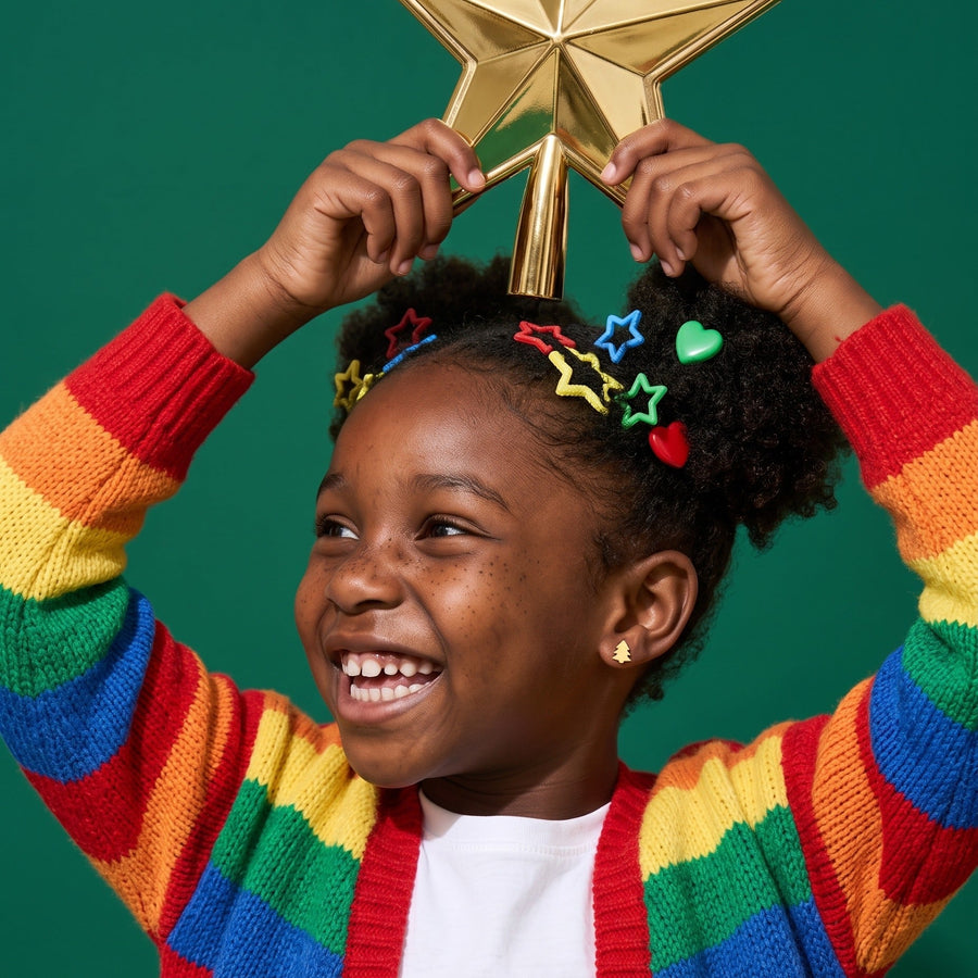 Golden Christmas Tree Flat Back Studs worn by a smiling girl, christmas look: hypoallergenic kids' earrings