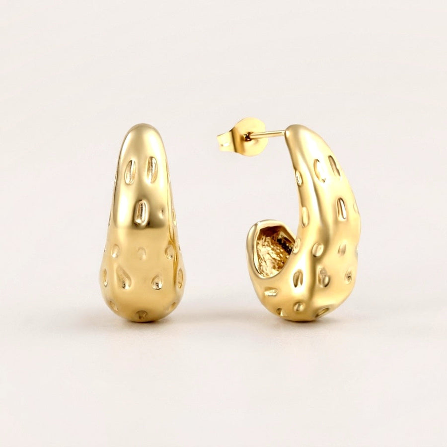 Golden Drip Hoops: hypoallergenic hoop earrings, shown front and side on a soft stone background