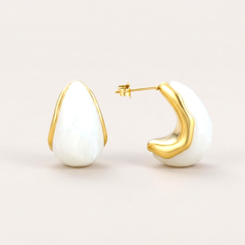 Ivory Teardrop Studs: hypoallergenic stud earrings, shown front and side on a soft stone background