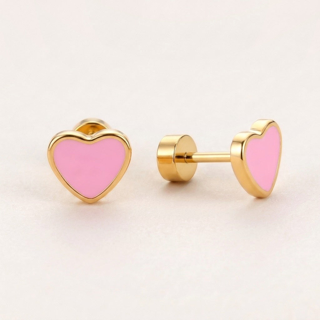 Love Heart Flat Back Studs Gold in Pink: hypoallergenic kids' flat back stud earrings, shown front and side on a soft stone background