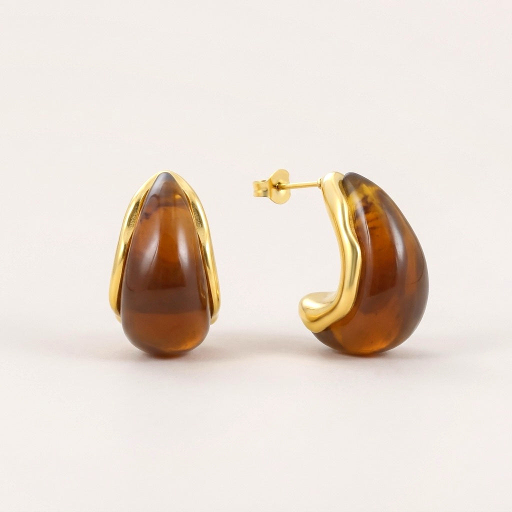 Mocha Teardrop Studs: hypoallergenic stud earrings, shown front and side on a soft stone background