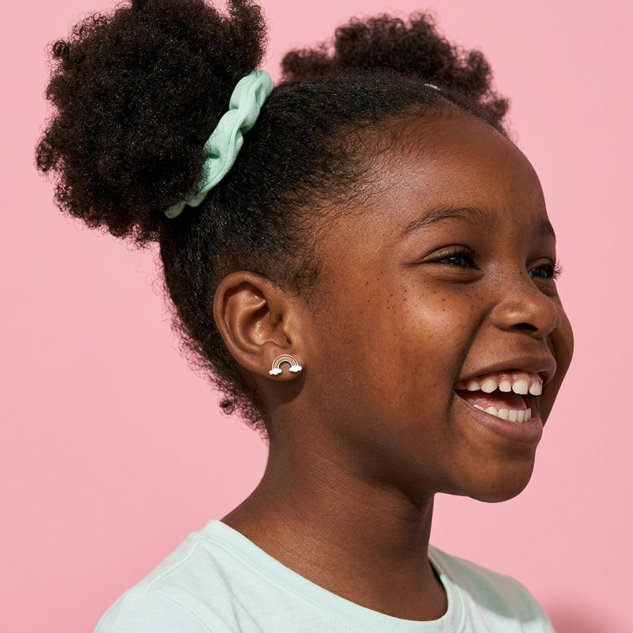 Rainbow Flat Back Studs Silver worn by a smiling girl