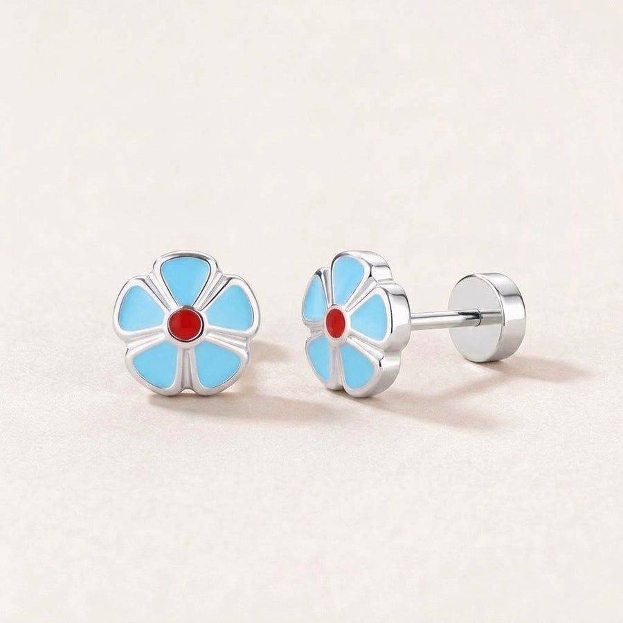 Petal Flower Flat Back Studs Silver in Light Blue: hypoallergenic kids' flat back stud earrings, shown front and side on a soft stone background