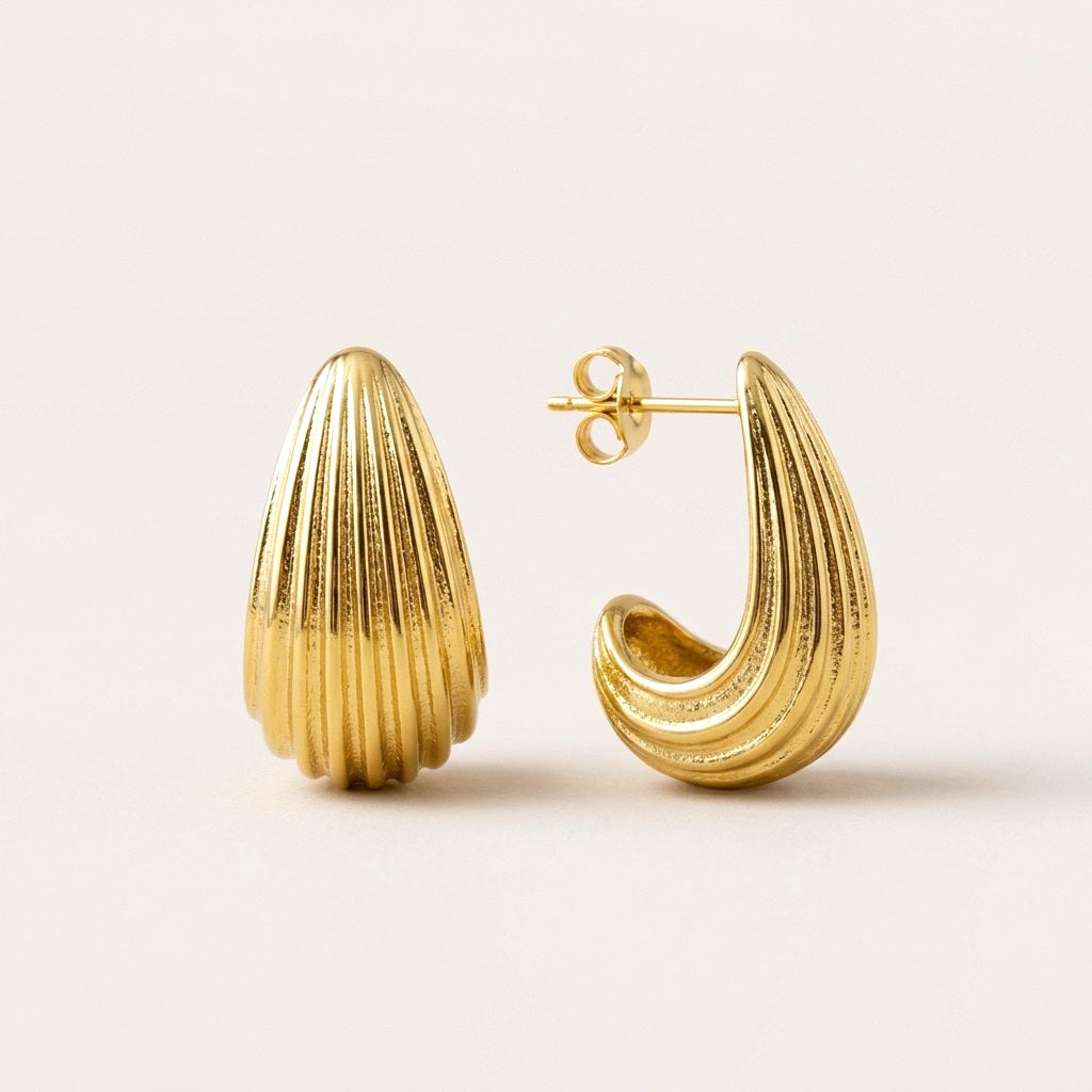 Ridged Teardrop Hoops: hypoallergenic hoop earrings, shown front and side on a soft stone background