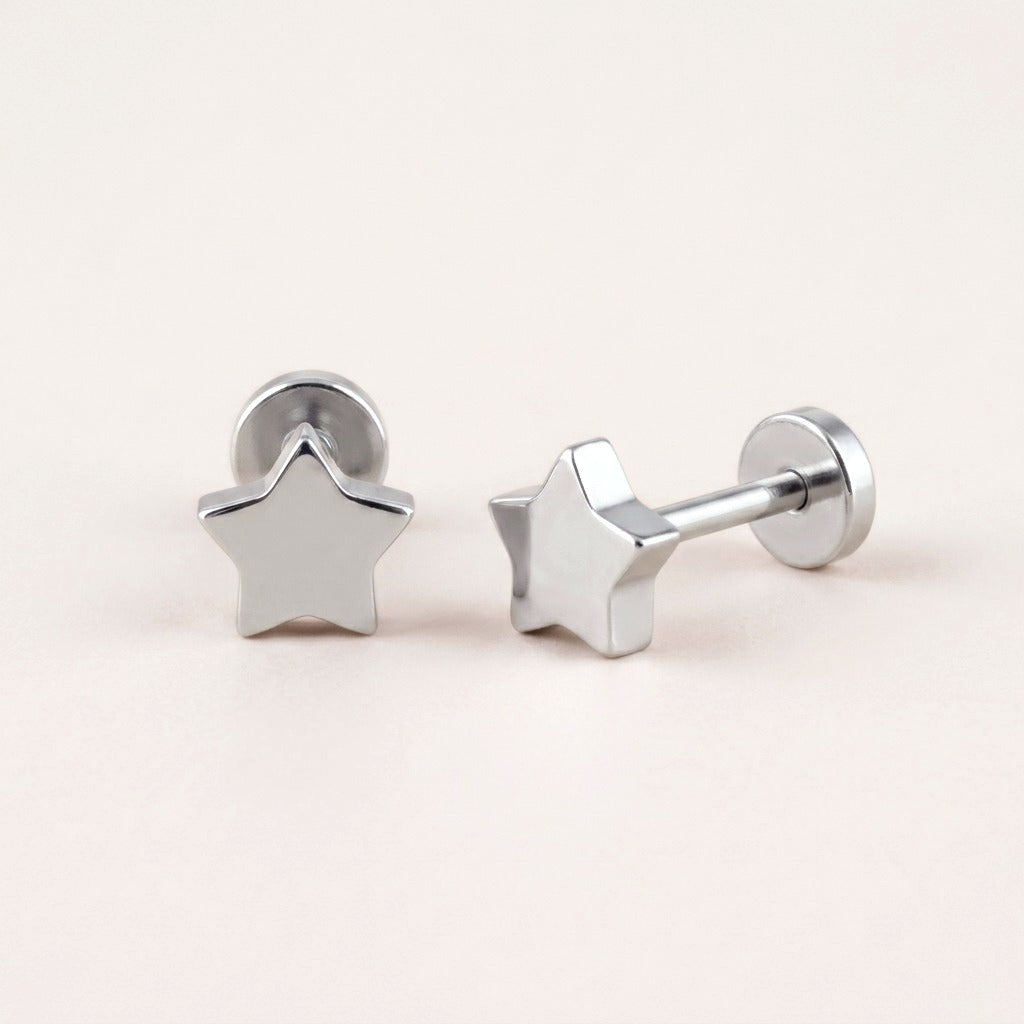 Star Flat Back Silver on a soft stone background