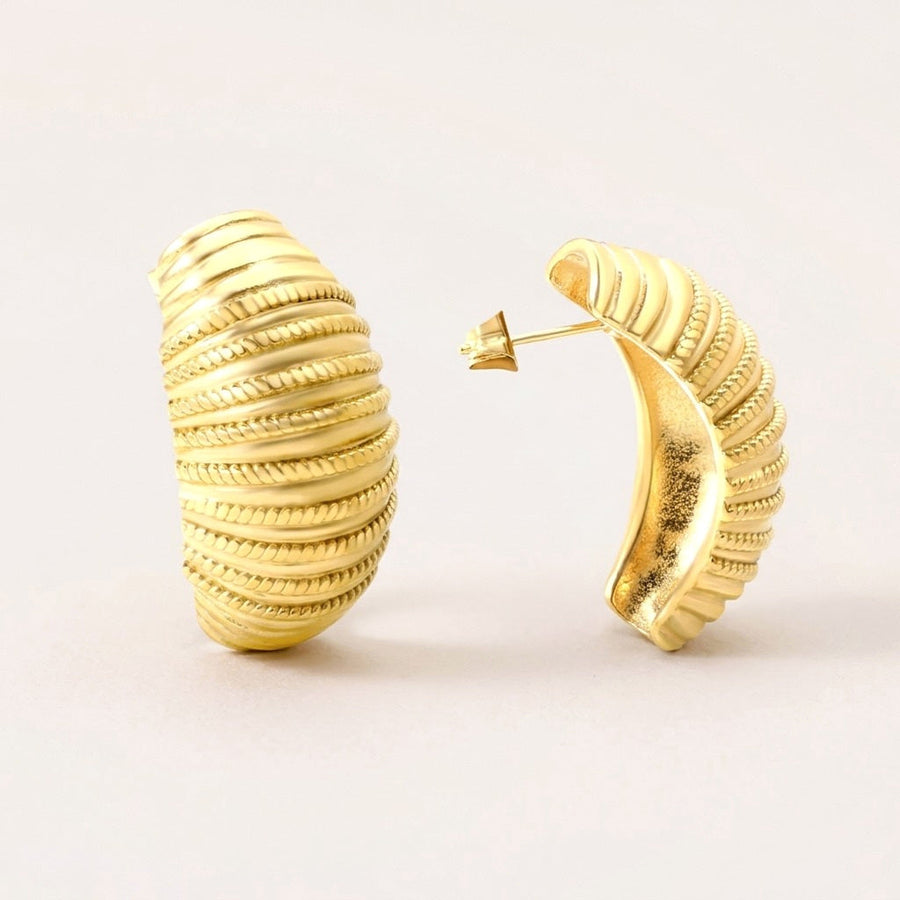 Textured Glow Hoops: hypoallergenic hoop earrings, shown front and side on a soft stone background