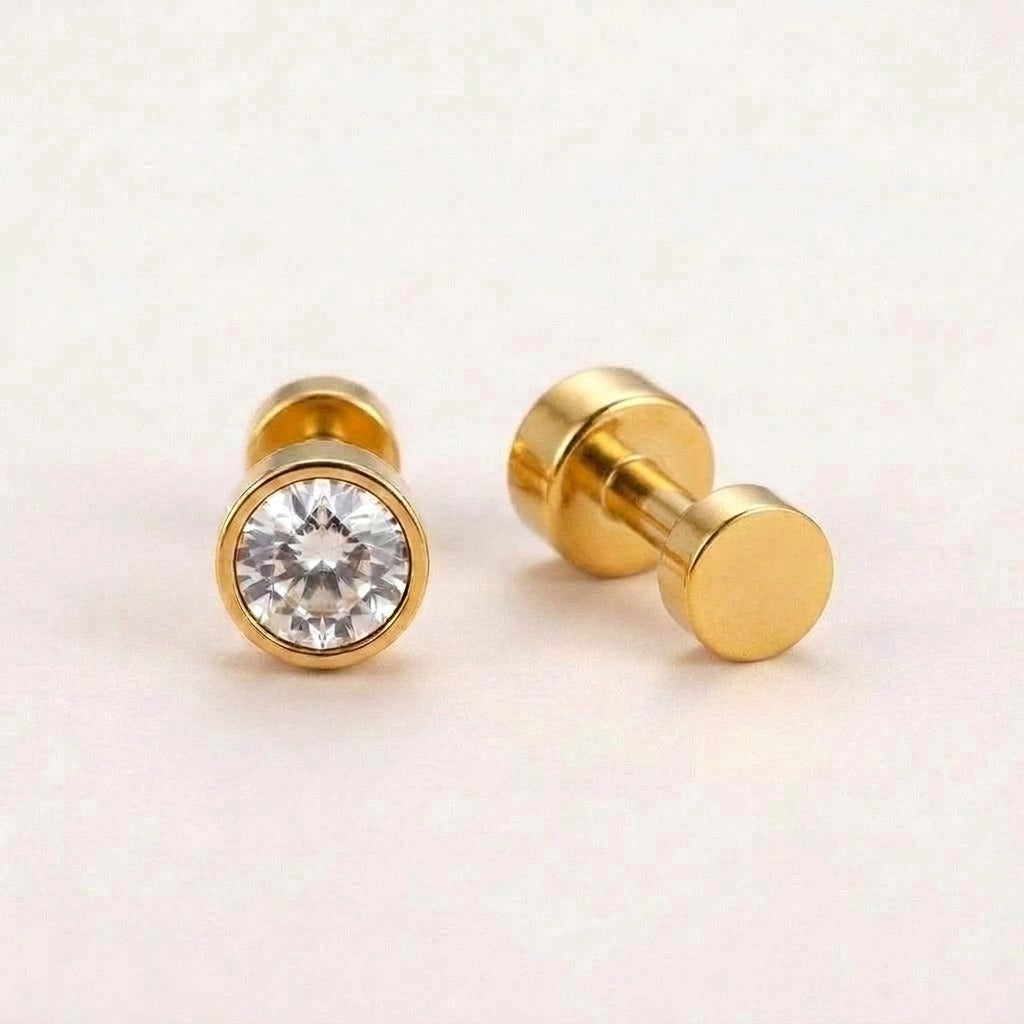Diamond Bezel Flat Back Studs Gold: hypoallergenic kids' flat back stud earrings, shown front and side on a soft stone background