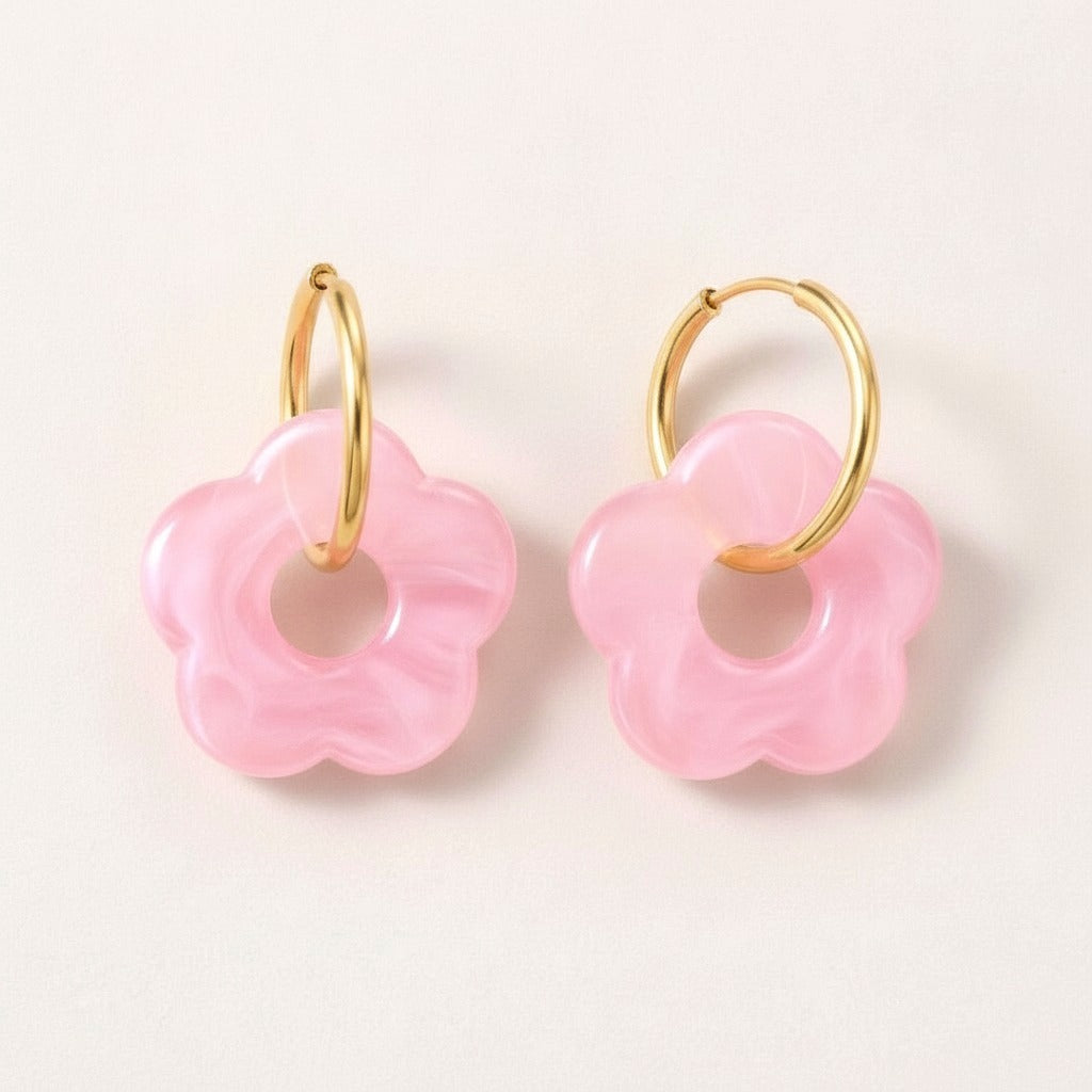 Frosted Bloom Hoops Pink: hypoallergenic kids' hoop earrings, shown front and side on a soft stone background