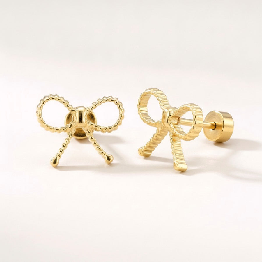 Ribbon Bow Flat Backs: hypoallergenic kids' flat back stud earrings, shown front and side on a soft stone background