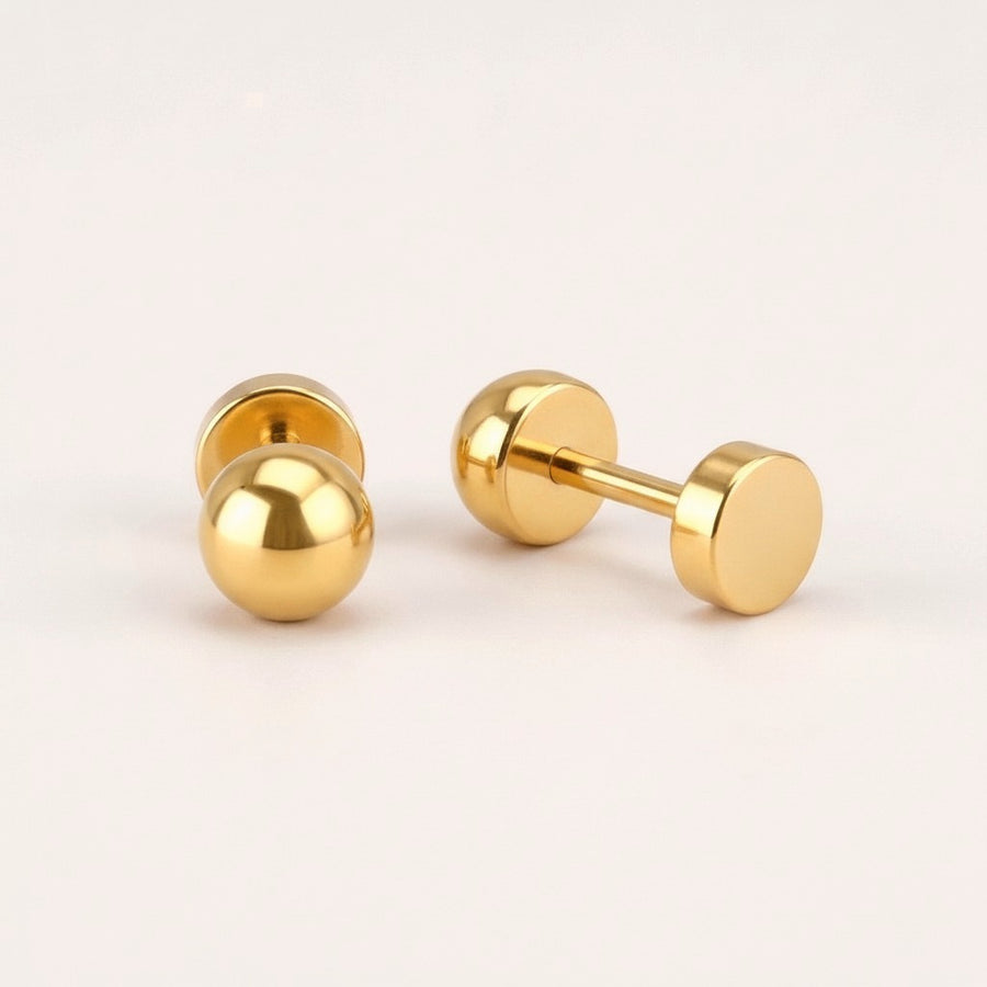 Simple Flat Back Studs Gold: hypoallergenic kids' flat back stud earrings, shown front and side on a soft stone background