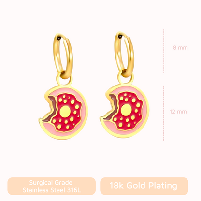 Donut-shaped earrings with gold plating on a white background