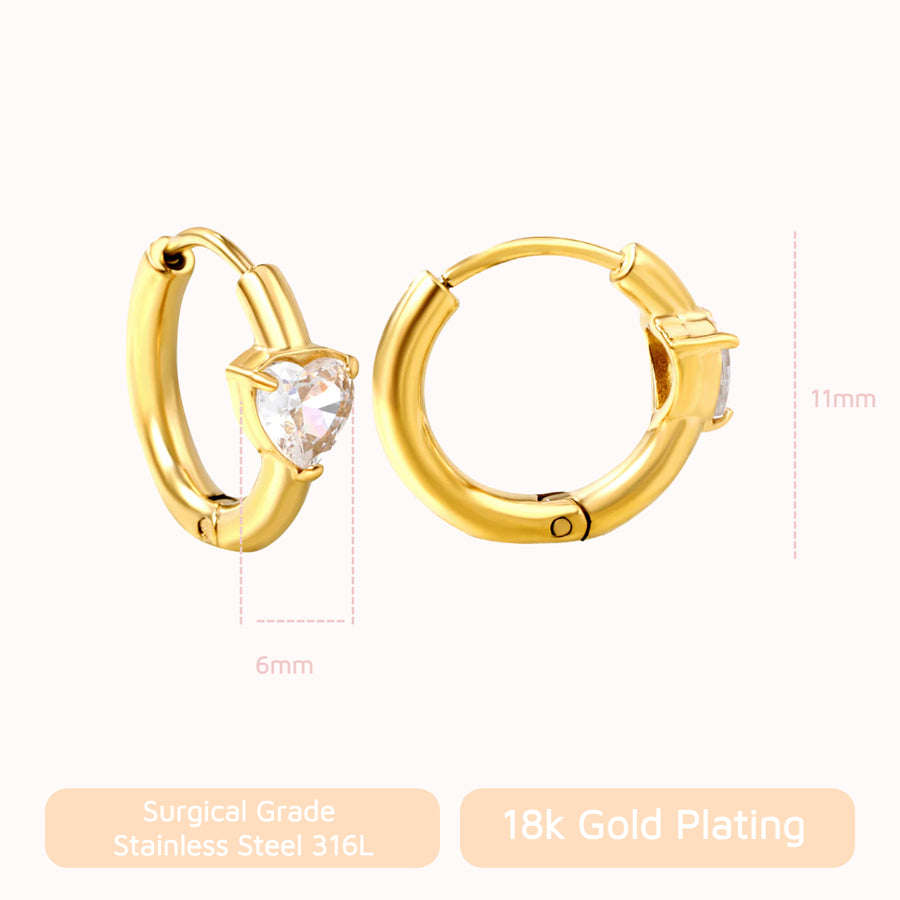 Sweetheart Spark Huggies: huggie hoops with a heart-shaped crystal