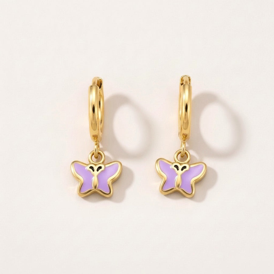 Butterfly Flutter Huggies Gold: hypoallergenic kids' huggie hoop earrings, shown front and side on a soft stone background