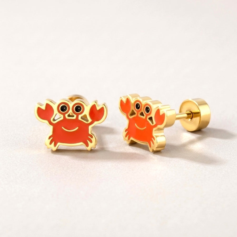 Crabby Flat Back Studs Gold: hypoallergenic kids' flat back stud earrings, shown front and side on a soft stone background