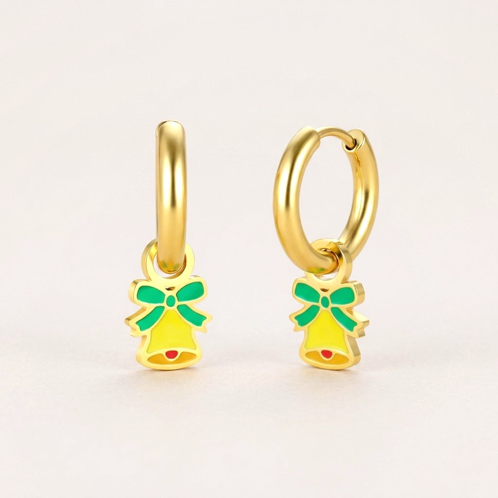 Christmas Bell Huggies: hypoallergenic kids' huggie hoop earrings, shown front and side on a soft stone background