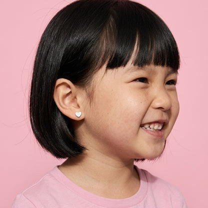 Classic Heart Flat Backs Silver worn by a smiling girl