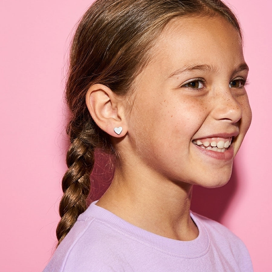 Classic Heart Flat Backs Silver worn by a smiling girl