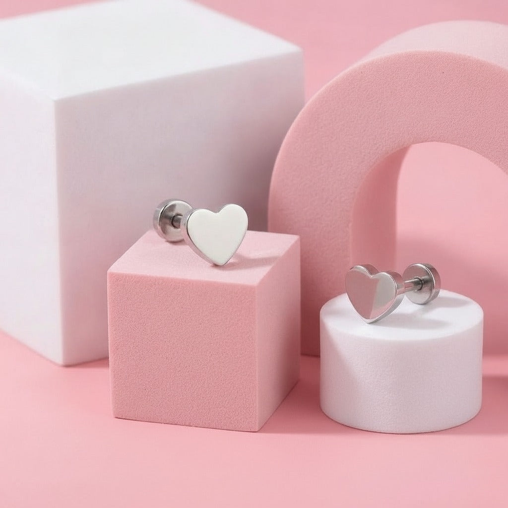 Classic Heart Flat Backs Silver styled on pastel blocks, front and side view