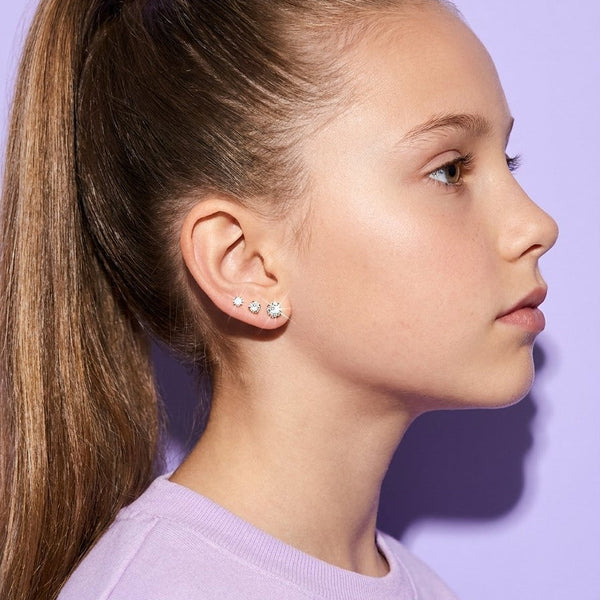 Diamond CZ Flat Back Studs worn in three sizes up the ear
