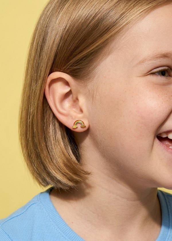 Child wearing Delilah earrings