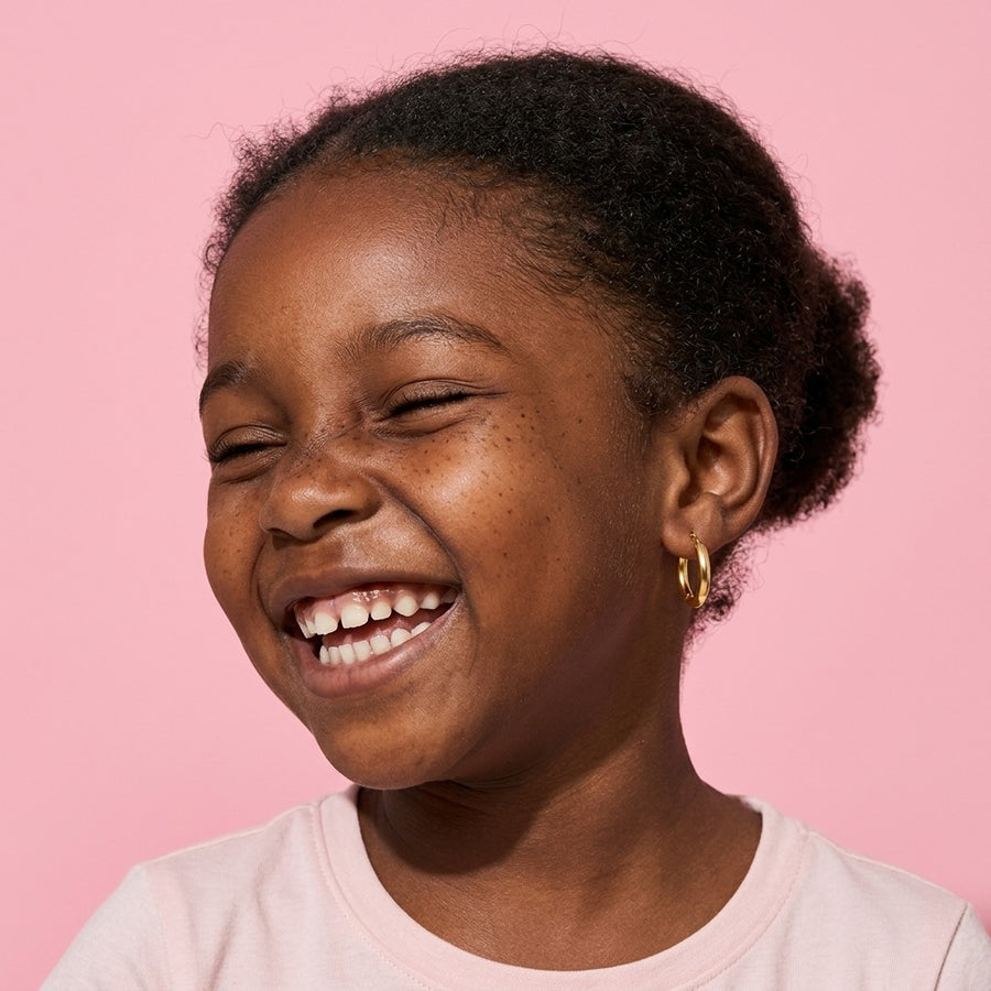Everyday Hoops Gold worn by a smiling girl