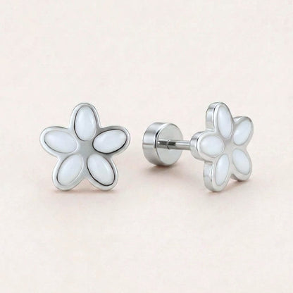 Flower Flat Back Studs Silver in White: hypoallergenic kids' flat back stud earrings, shown front and side on a soft stone background