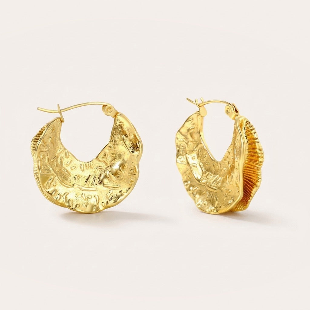 Gypsy Ruffle Hoops: hypoallergenic hoop earrings, shown front and side on a soft stone background