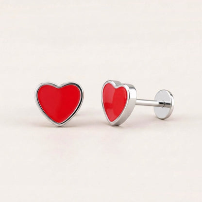 Love Heart Flat Back Studs Silver in Red: hypoallergenic kids' flat back stud earrings, shown front and side on a soft stone background