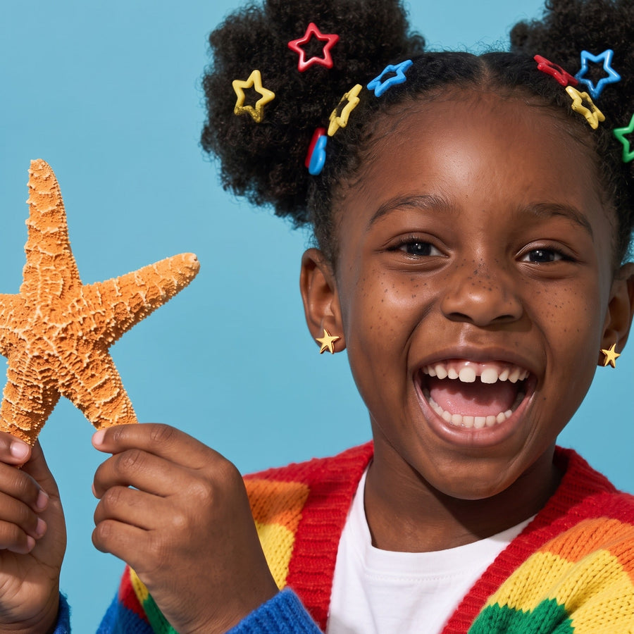 Starfish Flat Back Studs worn by a smiling girl, animal lover look: hypoallergenic kids' earrings