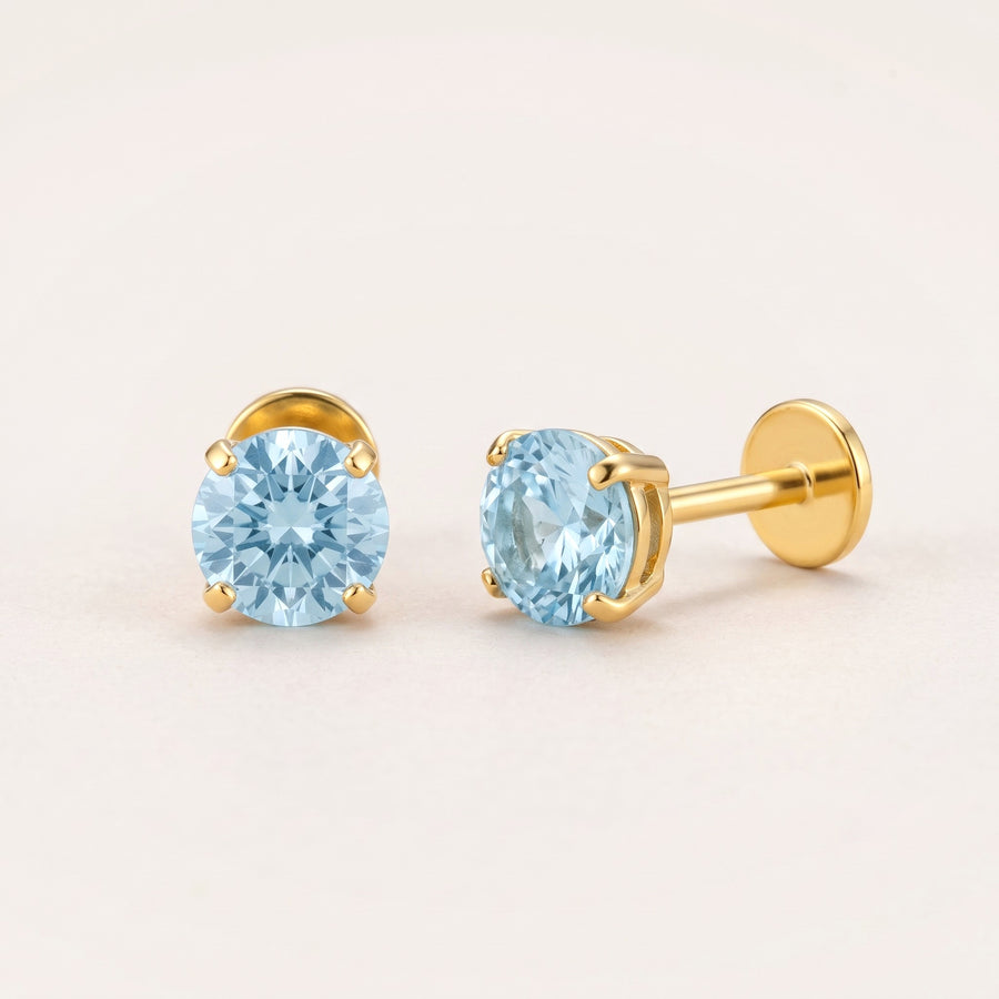 March birthstone earrings in gold: aquamarine colour flat back studs