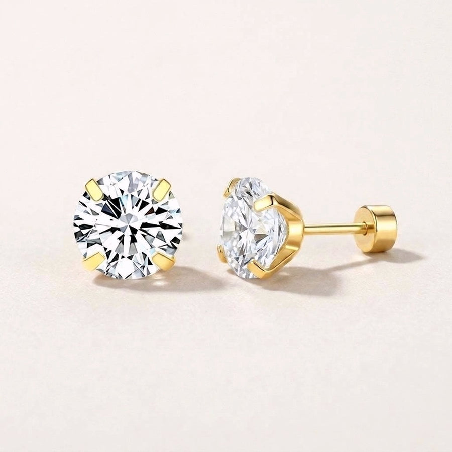 Diamond CZ Flat Back Studs Gold: hypoallergenic kids' flat back stud earrings, shown front and side on a soft stone background