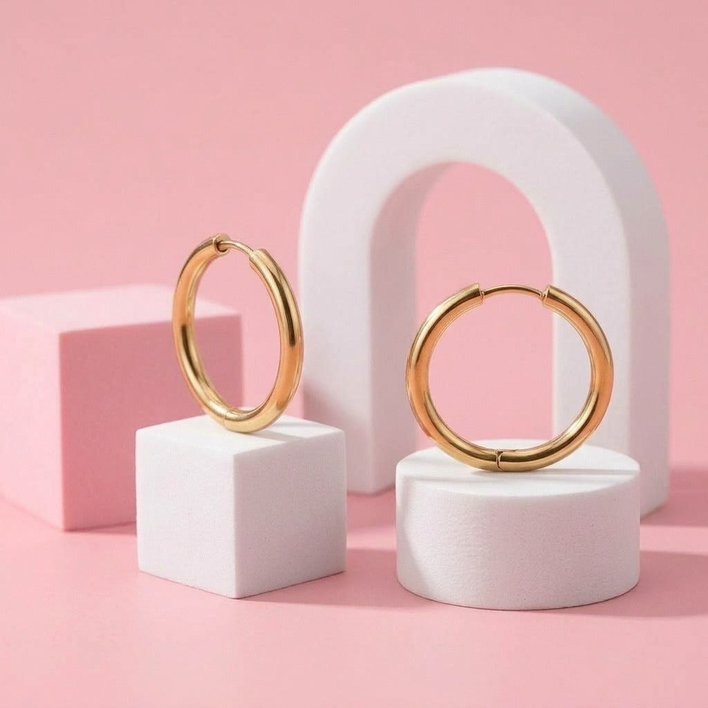 Everyday Hoops Gold: hypoallergenic kids' hoop earrings styled on pastel blocks
