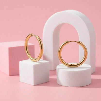 Everyday Hoops Gold: hypoallergenic kids' hoop earrings styled on pastel blocks