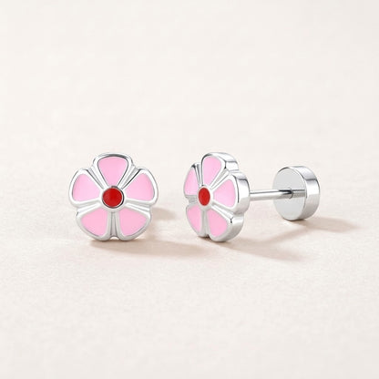 Petal Flower Flat Back Studs Silver: hypoallergenic kids' flat back stud earrings, shown front and side on a soft stone background